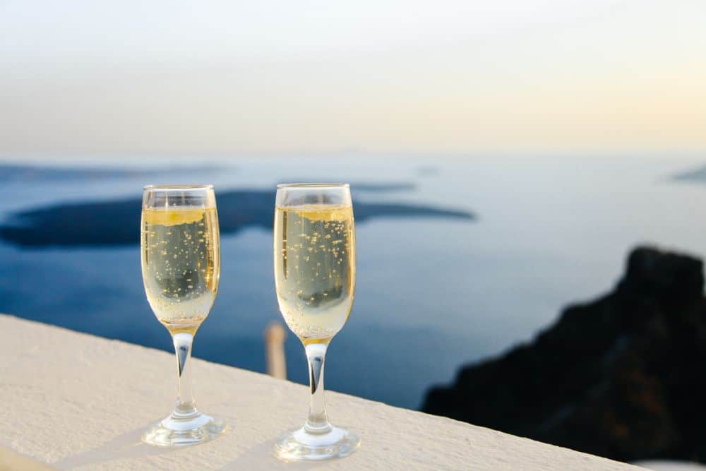 champagne with sunset luxury travel